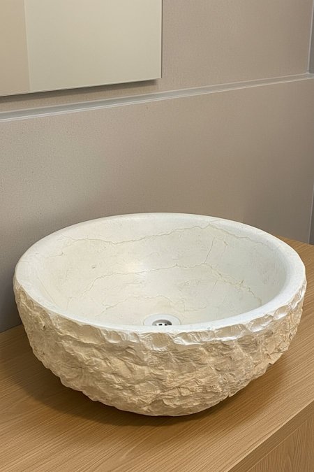 حوض مغسلة حجري طبيعي بنقشة خام – لون عاجي فاتح